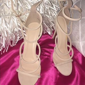 Nude faux suede tubed buckle up Heels